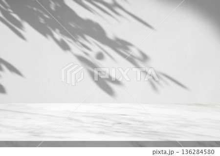 Marble table with tree shadow drop on white wall background for mockup product display Marble table with tree shadow drop on white wall background for mockup product display 136284580