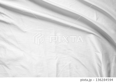 Abstract white wrinkled bedding sheet fabric texture background 136284594