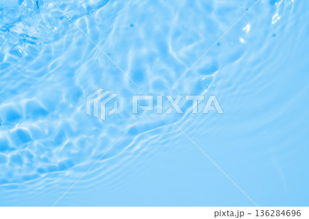 Abstract transparent water shadow surface texture natural ripple on blue background Abstract transparent water shadow surface texture natural ripple on blue background 136284696