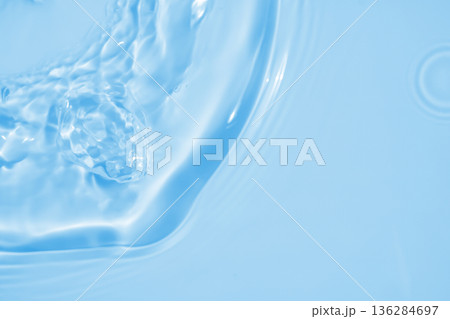 Abstract transparent water shadow surface texture natural ripple on blue background 136284697