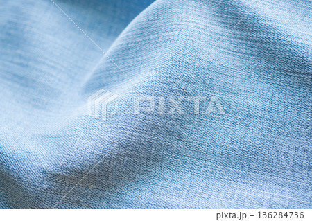 Old denim blue jeans fabric texture background close up 136284736