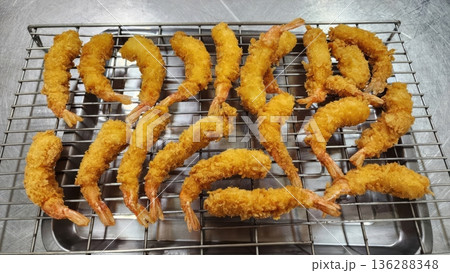 Golden Crispy Deep-Fried Breaded Shrimp or Ebi Fry on Metal Cooling Rack 136288348