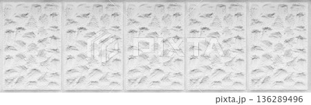 High contrast white plaster texture with deep embossed stone relief and vertical architectural segments High contrast white plaster texture with deep embossed stone relief and vertical architectural segments 136289496