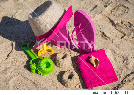 Accessories and children toys for playing or relax on sand at beach Accessories and children toys for playing or relax on sand at beach 136291332