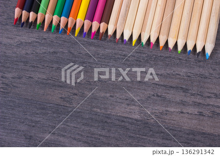 Crayons using for drawing, learning and developing creativity at school. Place for text board Crayons using for drawing, learning and developing creativity at school. Place for text board 136291342