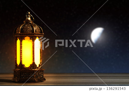 Golden Ramadan Lantern with Glowing Light and Blurred Crescent Moon on Dark Night Background. Ramadan kareem Concept. High quality photo Golden Ramadan Lantern with Glowing Light and Blurred Crescent Moon on Dark Night Background. Ramadan kareem Concept. High quality photo 136291543