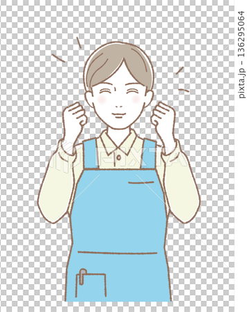 エプロン姿で笑顔のガッツポーズをする男性 介護・福祉スタッフ 136295064