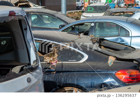 Damaged cars and debris from flooding caused by floods from hurricane DANA in Valencia, Spain Damaged cars and debris from flooding caused by floods from hurricane DANA in Valencia, Spain 136295637