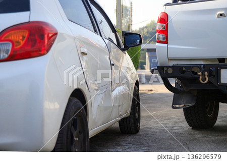 Car accident damage after collision on urban road 136296579