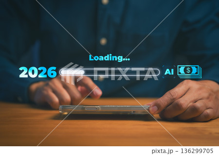 Close-up of hands using smartphone with futuristic loading bar showing 2026 and AI money icons, symbolizing innovation, digital finance, future technology, and business growth trends powered by AI. 136299705