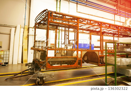 Bus assembly factory. Industrial production workshop, passenger transport assembly.  136302322