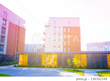 Bicycle parking in residential area at modern apartment buildings. Bicycle storage hangar Bicycle parking in residential area at modern apartment buildings. Bicycle storage hangar 136302348
