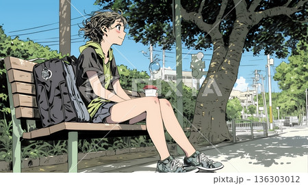 公園のベンチでひとり静かにくつろぐ若い女性