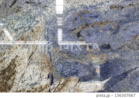 Azul Bahia blue marble texture with beige and black veins. This exotic granite from Brazil features luxury crystal patterns for interior design. 136307667