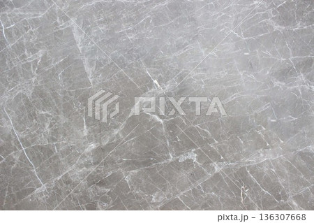 Grigio Carnico gray marble texture with fine white veins. This classic Italian marble provides a minimalist and elegant feel for floors or walls. 136307668