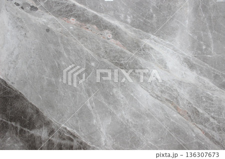 Grigio Billiemi gray marble texture with white diagonal veins and slight red hues. This stone from Sicily features a modern and dynamic look. Grigio Billiemi gray marble texture with white diagonal veins and slight red hues. This stone from Sicily features a modern and dynamic look. 136307673