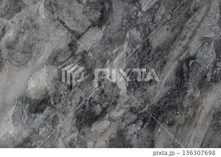 Grigio Carnico marble texture from Italy with a dramatic natural blend of dark gray tones and white patches. 136307698
