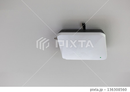 wireless router for network, hang on the ceiling. world wide network technology wireless router for network, hang on the ceiling. world wide network technology 136308560