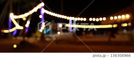 vintage tone blur image of food stall at night festival with bokeh vintage tone blur image of food stall at night festival with bokeh 136308966