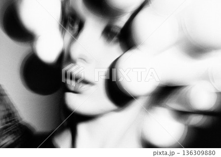 Woman's abstract black and white portrait with bokeh Woman's abstract black and white portrait with bokeh 136309880