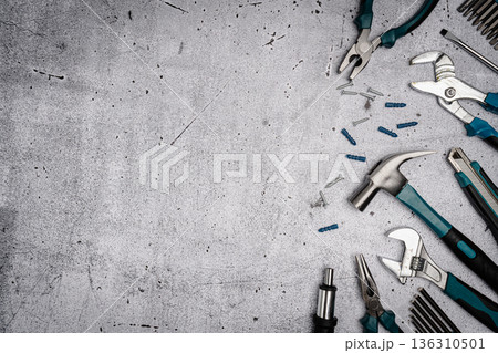 Set of tools on concrete background, 136310501