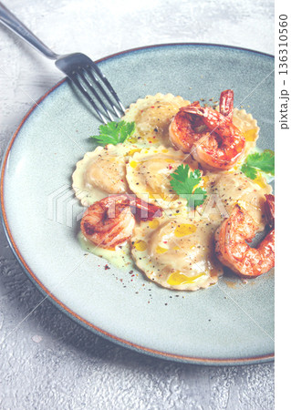 ravioli with shrimp, in cream sauce, with spices and herbs, top view, no people, ravioli with shrimp, in cream sauce, with spices and herbs, top view, no people, 136310560