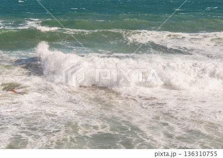 Natural marine background of stormy sea surface, powerful waves and white foam. 136310755