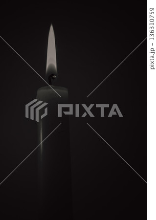Single burning candle in black and white on dark background, mourning concept or energy blackout illustration, symbol of hope and memory in darkness 136310759