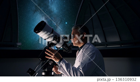 Astronomer in white lab coat observing stars through telescope in observatory, with stunning view of the night sky filled with stars and galaxies, showcasing passion for astronomy and exploration 136310932
