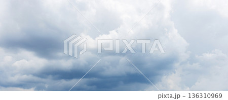 Panoramic view of sky with stormy gray clouds Panoramic view of sky with stormy gray clouds 136310969