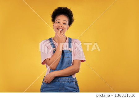 Thinking, decision and black woman in studio with choice, option or solution on yellow background. idea, doubt and African lady with questions, why or problem solving, ask or puzzled body language Thinking, decision and black woman in studio with choice, option or solution on yellow background. idea, doubt and African lady with questions, why or problem solving, ask or puzzled body language 136311310