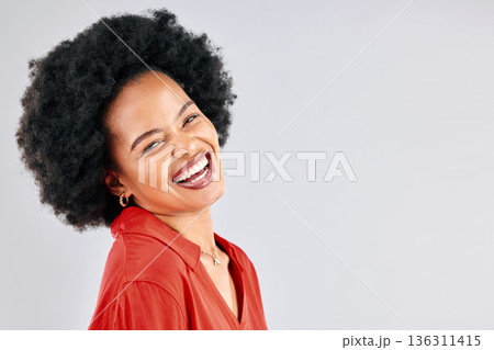 Laughing, smile and portrait of businesswoman in studio with success, confidence and leadership. Happy, excited and young African female designer with positive mindset by gray background with mockup. 136311415