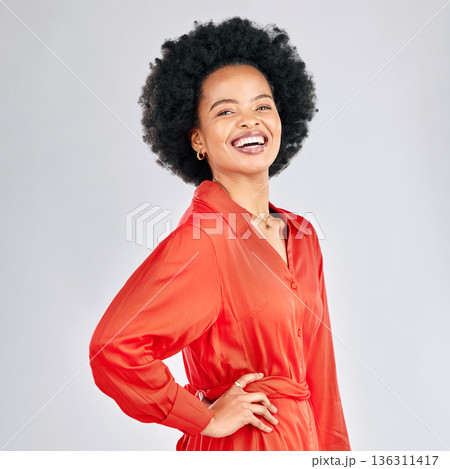 Portrait, smile and fashion with an afro black woman in studio on a white background for trendy style. Aesthetic, confident and red clothes with a happy young female model posing in a clothing outfit 136311417