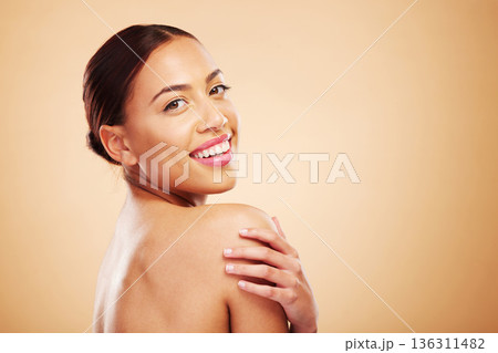 Portrait, mockup or happy woman with natural beauty in studio on brown background for wellness or glow. Facial treatment, body care or face of Brazilian girl model with self love, or skincare shine Portrait, mockup or happy woman with natural beauty in studio on brown background for wellness or glow. Facial treatment, body care or face of Brazilian girl model with self love, or skincare shine 136311482