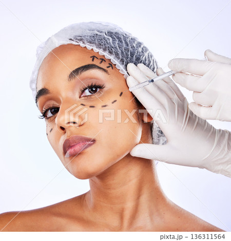 Plastic surgery, collagen and injection with portrait of woman in studio for hyaluronic acid, skincare and beauty. Spa, medical and cosmetics with face of model on white background for facial fillers Plastic surgery, collagen and injection with portrait of woman in studio for hyaluronic acid, skincare and beauty. Spa, medical and cosmetics with face of model on white background for facial fillers 136311564