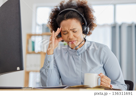 Customer support, call center and woman with crisis in office with tension, stress and headache. Telemarketing, crm service and overworked female person with burnout, frustrated and exhausted at desk Customer support, call center and woman with crisis in office with tension, stress and headache. Telemarketing, crm service and overworked female person with burnout, frustrated and exhausted at desk 136311691