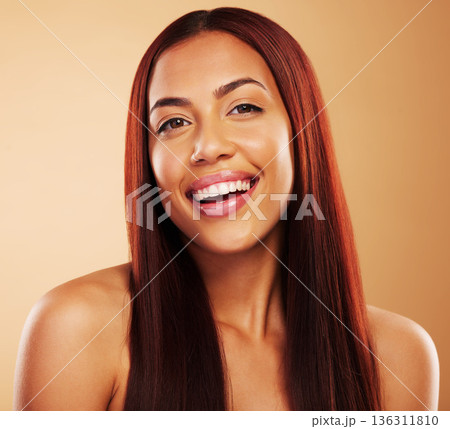 Hair care, beauty and portrait of happy woman with glow, luxury salon treatment and brown background. Natural smile, haircut and haircare, face of model with cosmetics and keratin shine in studio. 136311810