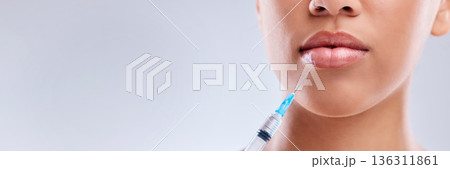 Lip filler, injection and beauty banner, woman and cosmetic surgery and dermatology on white background. Face, skincare and syringe, female model and mockup space with liquid collagen in studio Lip filler, injection and beauty banner, woman and cosmetic surgery and dermatology on white background. Face, skincare and syringe, female model and mockup space with liquid collagen in studio 136311861