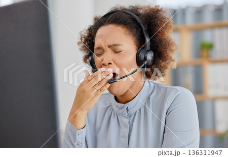 Customer support, call center and woman yawn, tired in office with exhausted, stress and fatigue. Telemarketing, crm service and overworked female person with burnout for consulting business at desk Customer support, call center and woman yawn, tired in office with exhausted, stress and fatigue. Telemarketing, crm service and overworked female person with burnout for consulting business at desk 136311947
