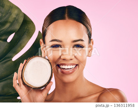 Fruit, coconut and portrait of woman with skincare, beauty and cosmetics for natural or vegan facial care, dermatology or treatment. Smile, happy and healthy girl with product, cream or moisturizer Fruit, coconut and portrait of woman with skincare, beauty and cosmetics for natural or vegan facial care, dermatology or treatment. Smile, happy and healthy girl with product, cream or moisturizer 136311958