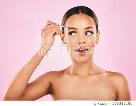 Woman, tweezers and eyebrow, beauty and cosmetics tools with transformation on pink background. Face, skin and microblading with glow, female model and hair removal, makeup and grooming in studio 136312196