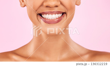 Woman, teeth and smile, beauty and dental with shine on lips, oral health and veneers isolated on pink background. Female model, orthodontics and wellness, cosmetics and closeup of mouth in studio Woman, teeth and smile, beauty and dental with shine on lips, oral health and veneers isolated on pink background. Female model, orthodontics and wellness, cosmetics and closeup of mouth in studio 136312219