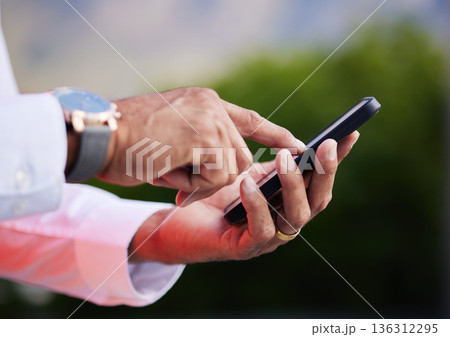 Business man, hands and smartphone in city to search social network, mobile website and internet contact. Closeup of worker outdoor with cellphone, reading corporate news app and typing information Business man, hands and smartphone in city to search social network, mobile website and internet contact. Closeup of worker outdoor with cellphone, reading corporate news app and typing information 136312295
