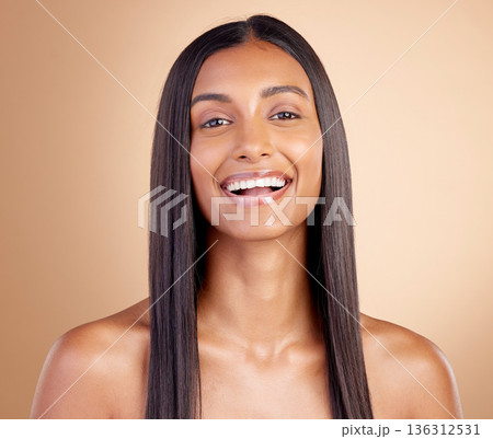Beauty, happy and hair with portrait of woman in studio for shampoo, salon and hairstyle. Skincare, cosmetics and self care with face of female model on brown background for makeup, glow and spa 136312531