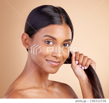 Strong hair, portrait or happy woman with beauty, skincare or self care for glow, shine or collagen in shampoo. Healthy texture, model or Indian girl smiling with cosmetics for treatment or grooming 136312536