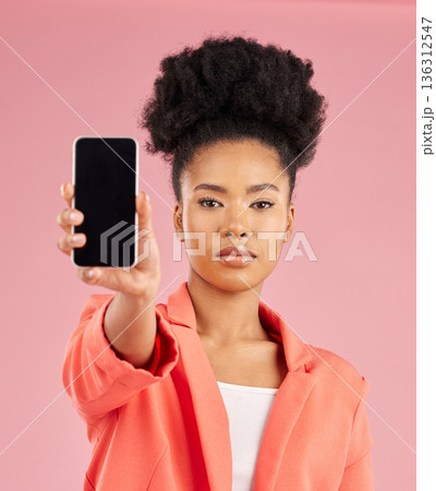 Portrait of black woman, phone and screen in studio for contact info, website promo or social media. Cellphone, mobile app and model on pink background with online news announcement, offer or deal. Portrait of black woman, phone and screen in studio for contact info, website promo or social media. Cellphone, mobile app and model on pink background with online news announcement, offer or deal. 136312547