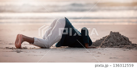 Search, digging and a man in the beach sand in nature for travel fun or holiday adventure in summer. Earth, looking and a person with a check in the ground at the ocean for treasure on vacation 136312559