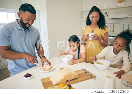 Parents, prepare and children in kitchen for breakfast, lunch and eating meal at home together. Happy family, morning and girls, mother and father with food for healthy diet, hunger and nutrition 136312569