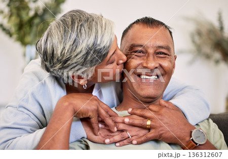 Love portrait, kiss and happy elderly couple bond, relax and enjoy time together, smile and retirement wellness. Home apartment, sofa and face of elderly man, woman or people with marriage happiness 136312607