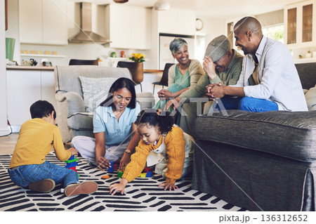 Big family, love or happy children on floor with toys for playing, creative fun or bonding at home. Development, smile or kids enjoy building blocks games to relax with mom, dad or grandparents 136312652